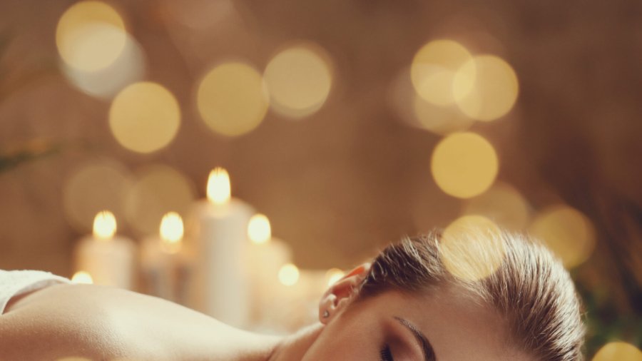 Massage. Beautiful girl in spa salon